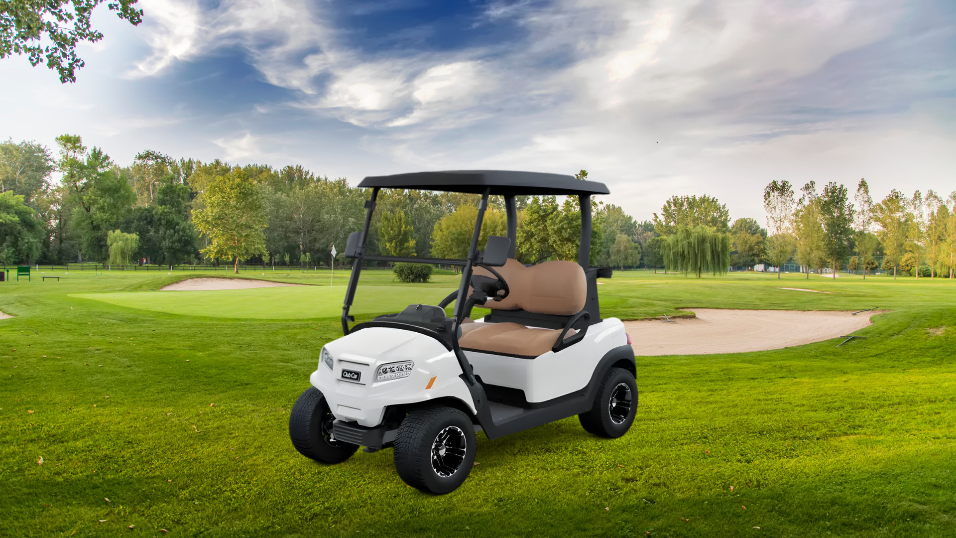 White golf cart with tan seats parked on a green golf course near a sand bunker.