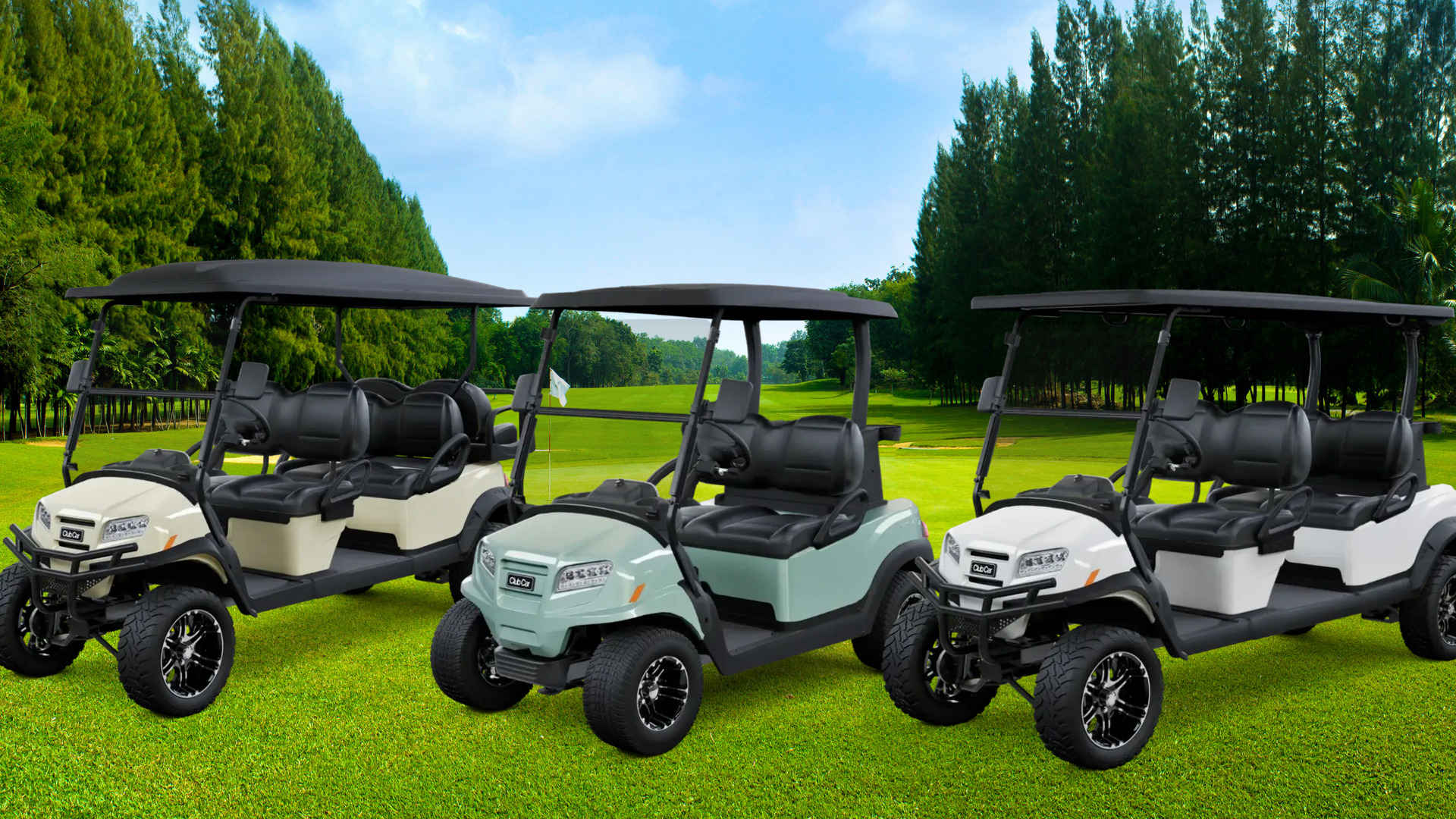 Three Club Car golf carts in cream, green, and white lined up on a golf course.